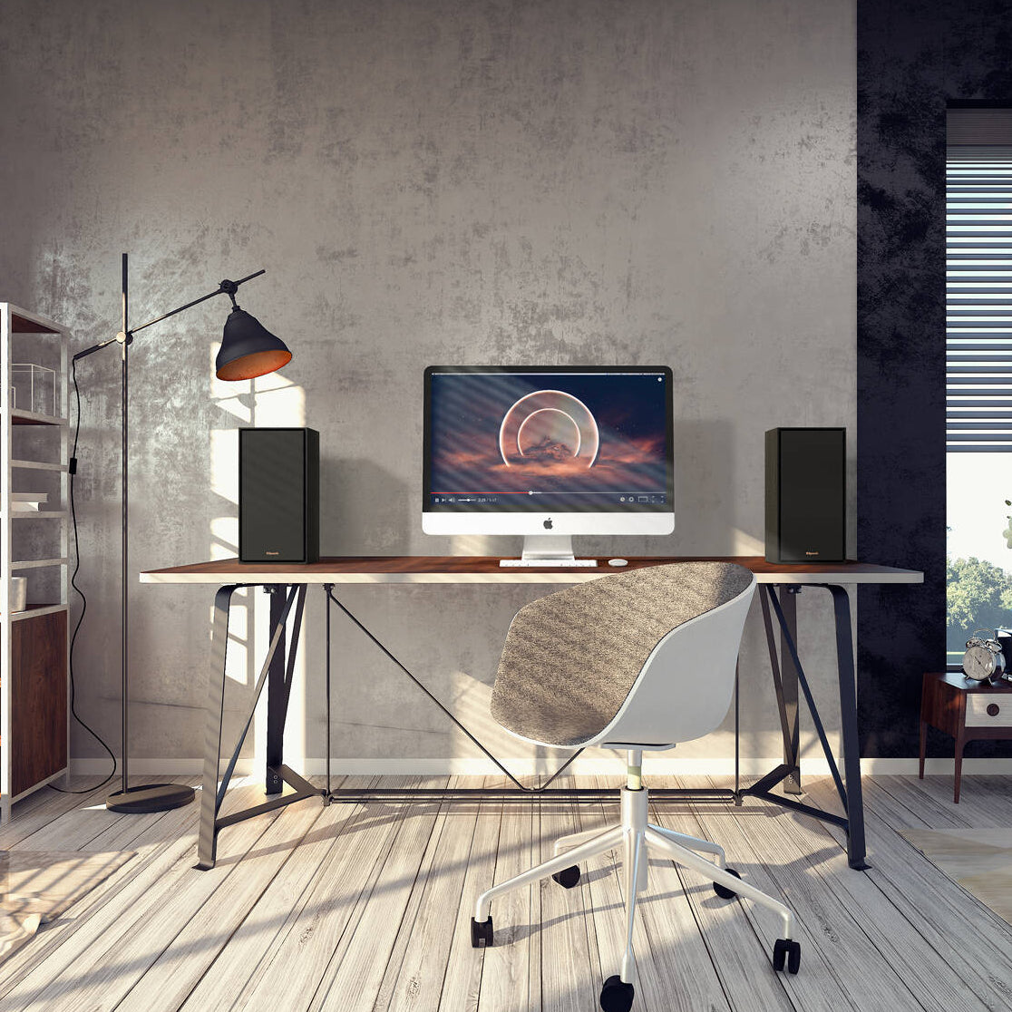 Black Klipsch R-50PM wireless speakers shown with front and side views, featuring sleek design and modern audio equipment.