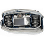 Think Tank PressPass video equipment bag with padded compartments and adjustable straps for professional camera gear transport.