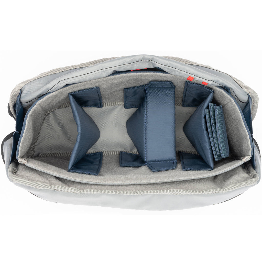 Think Tank PressPass video equipment bag with padded compartments and adjustable straps for professional camera gear storage.