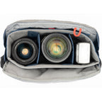 Think Tank PressPass video equipment bag with padded compartments and adjustable straps for professional camera gear storage.