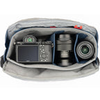 Think Tank PressPass video equipment bag with padded compartments and adjustable straps for professional camera gear storage.