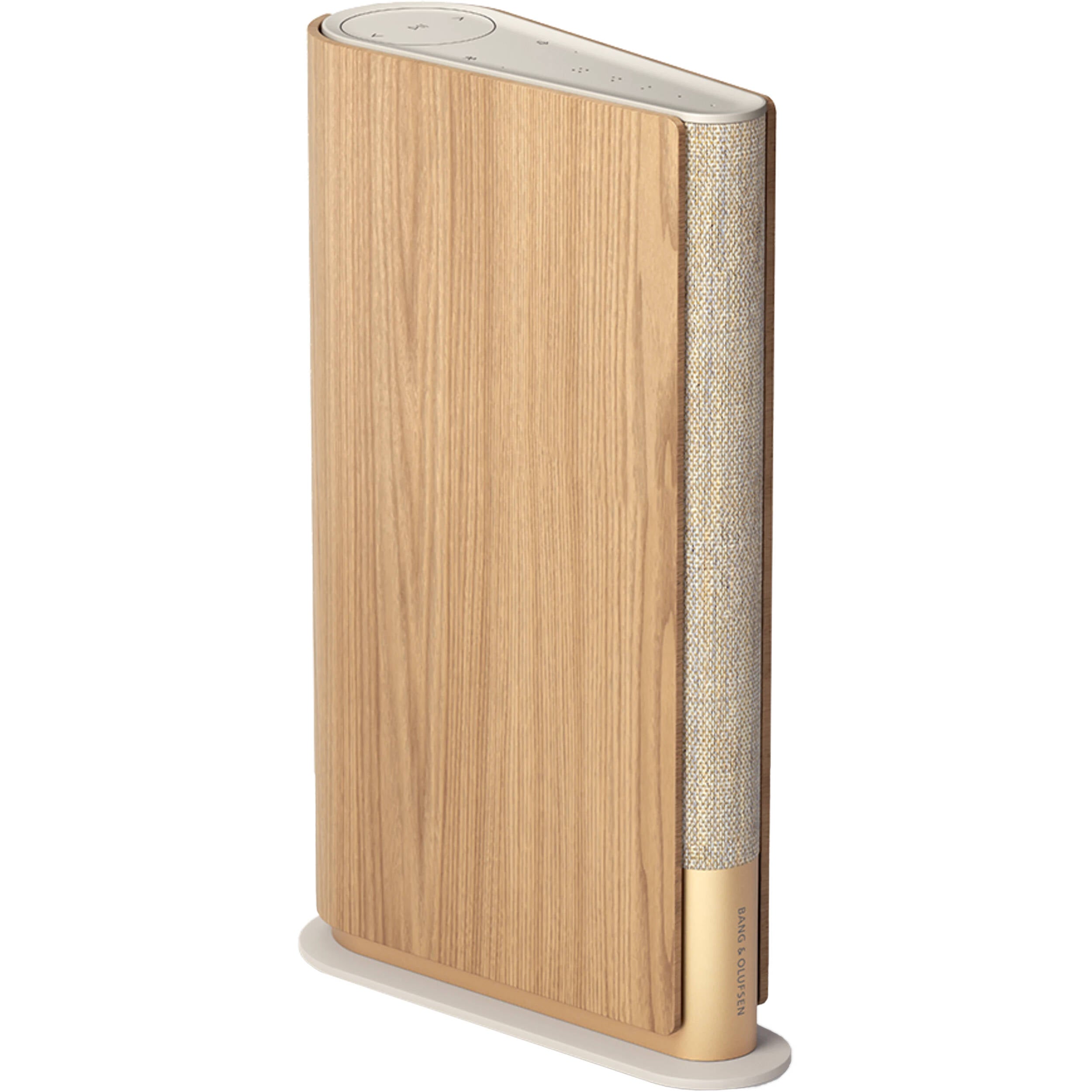 Bang & Olufsen Beosound Emerge wireless speaker in gold tone, showcasing its sleek modern design and fabric grille.