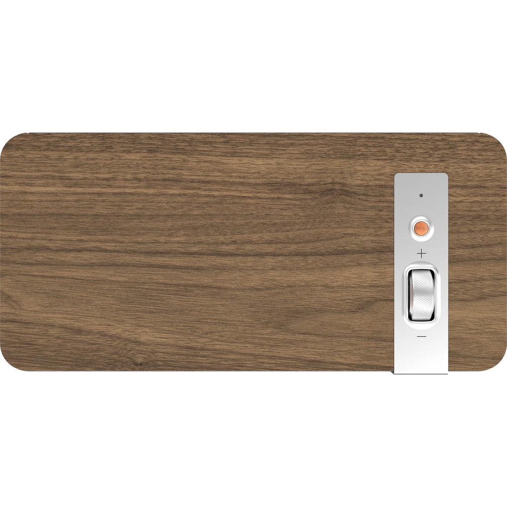 Wireless Klipsch The One Plus speaker with wooden finish, compact design, and control buttons on top.