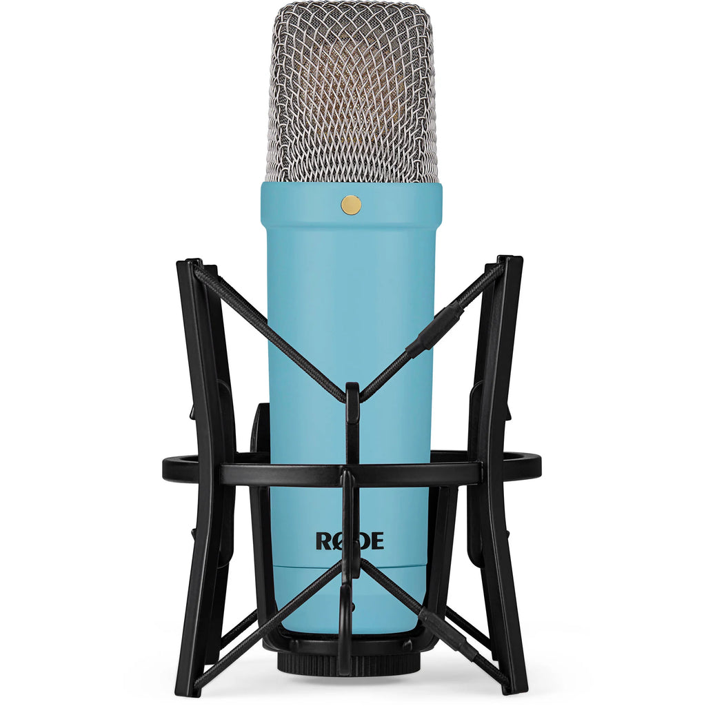 Rode NT1 Signature Series condenser microphone with black body and gold accents, positioned on a stand for studio recording.