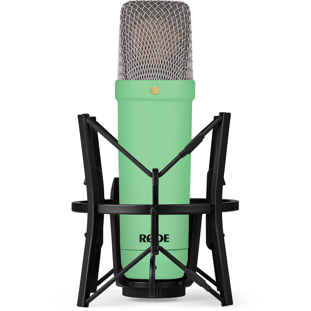 Rode NT1 Signature Series condenser microphone with black finish, shown from a slight angle, capturing studio audio equipment.