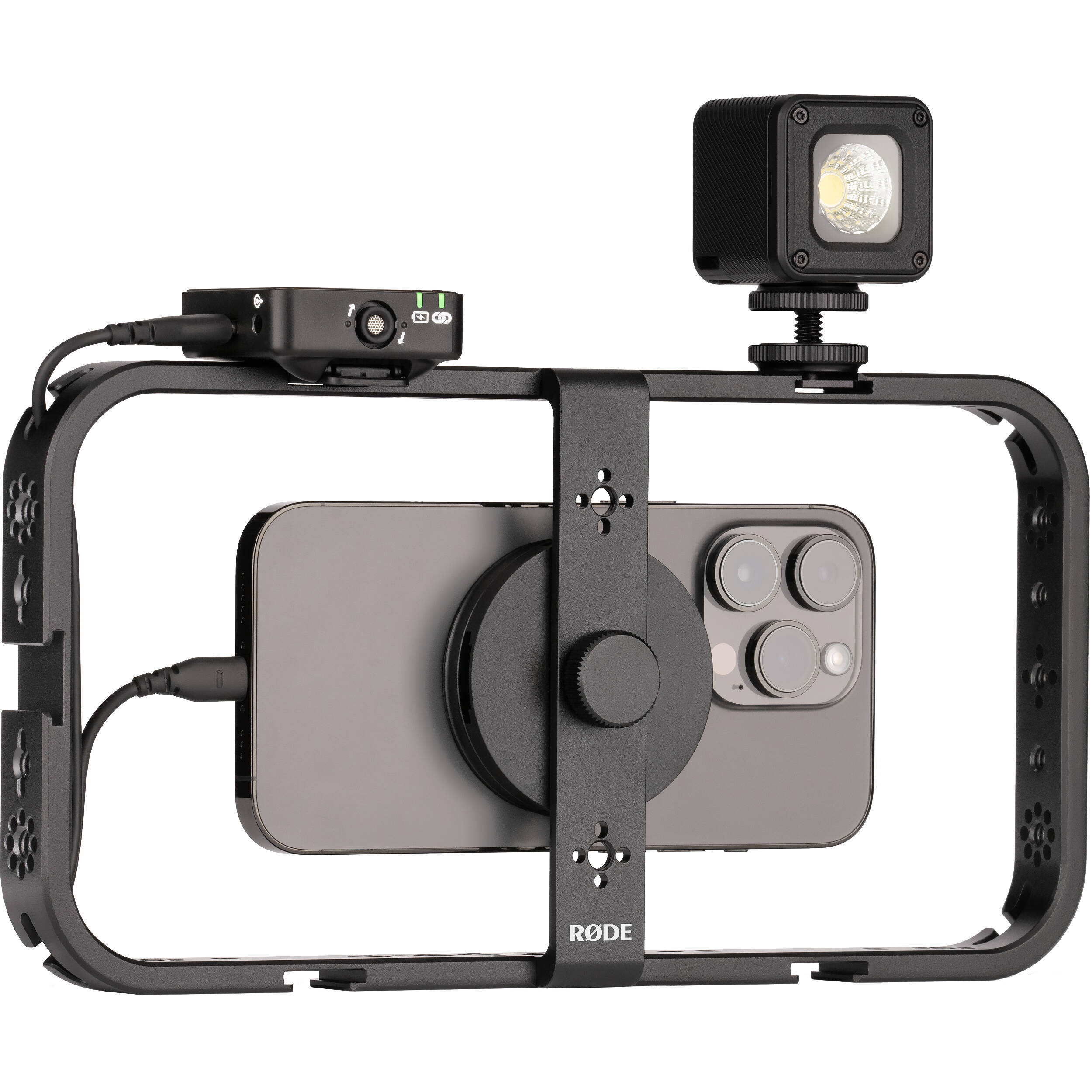 Rode Phone Cage mounted on a tripod for smartphone video recording with adjustable support and grip.