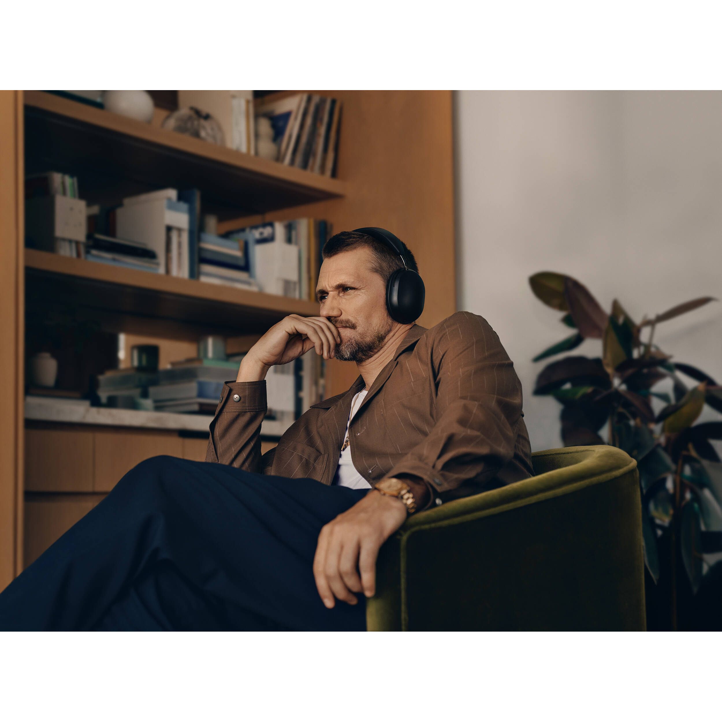 Sonos Ace wireless headphones in black with padded ear cups and adjustable headband, designed for premium sound and comfort.