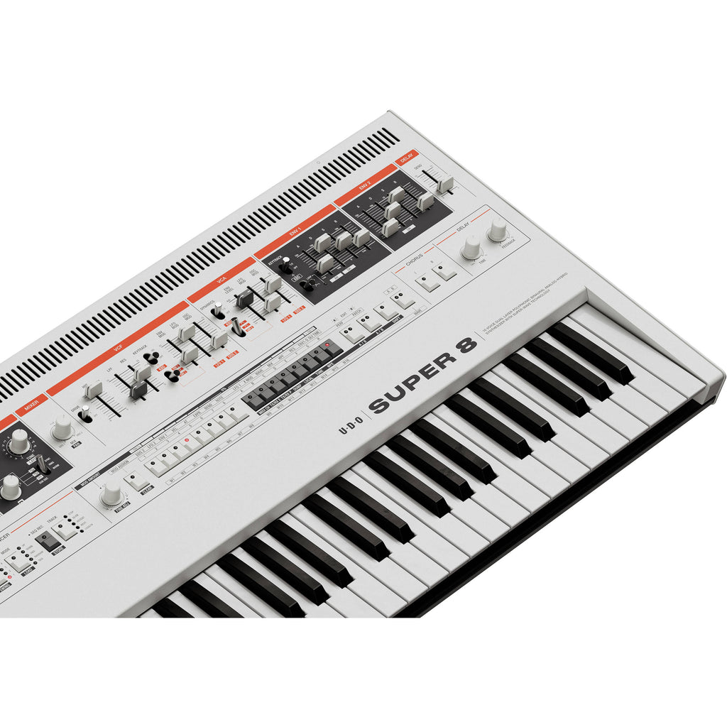 UDO Audio Super 8 synthesizer with vintage-style controls and colorful interface, showcasing its front panel and knobs.