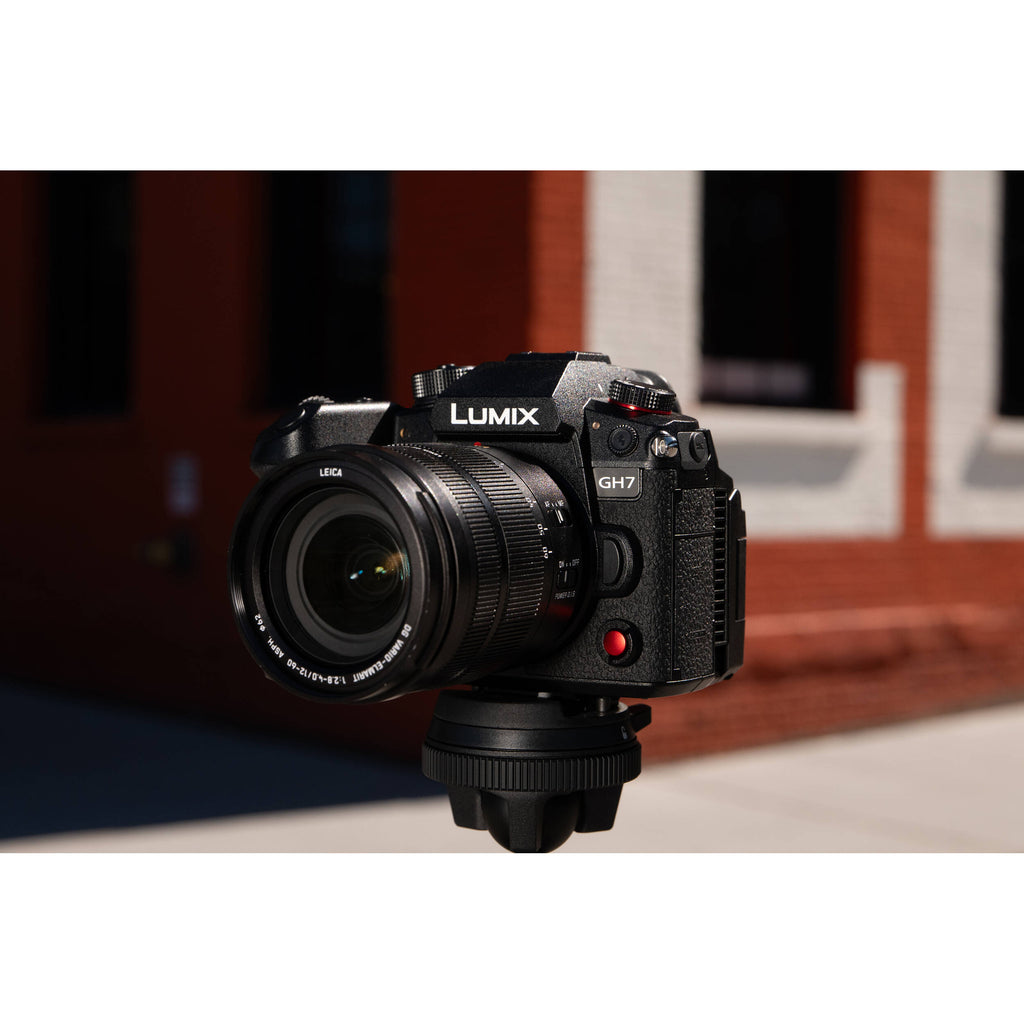 Panasonic Lumix GH7 mirrorless camera with 12-60mm f/2.8-4 lens, showcasing its compact design and camera controls.