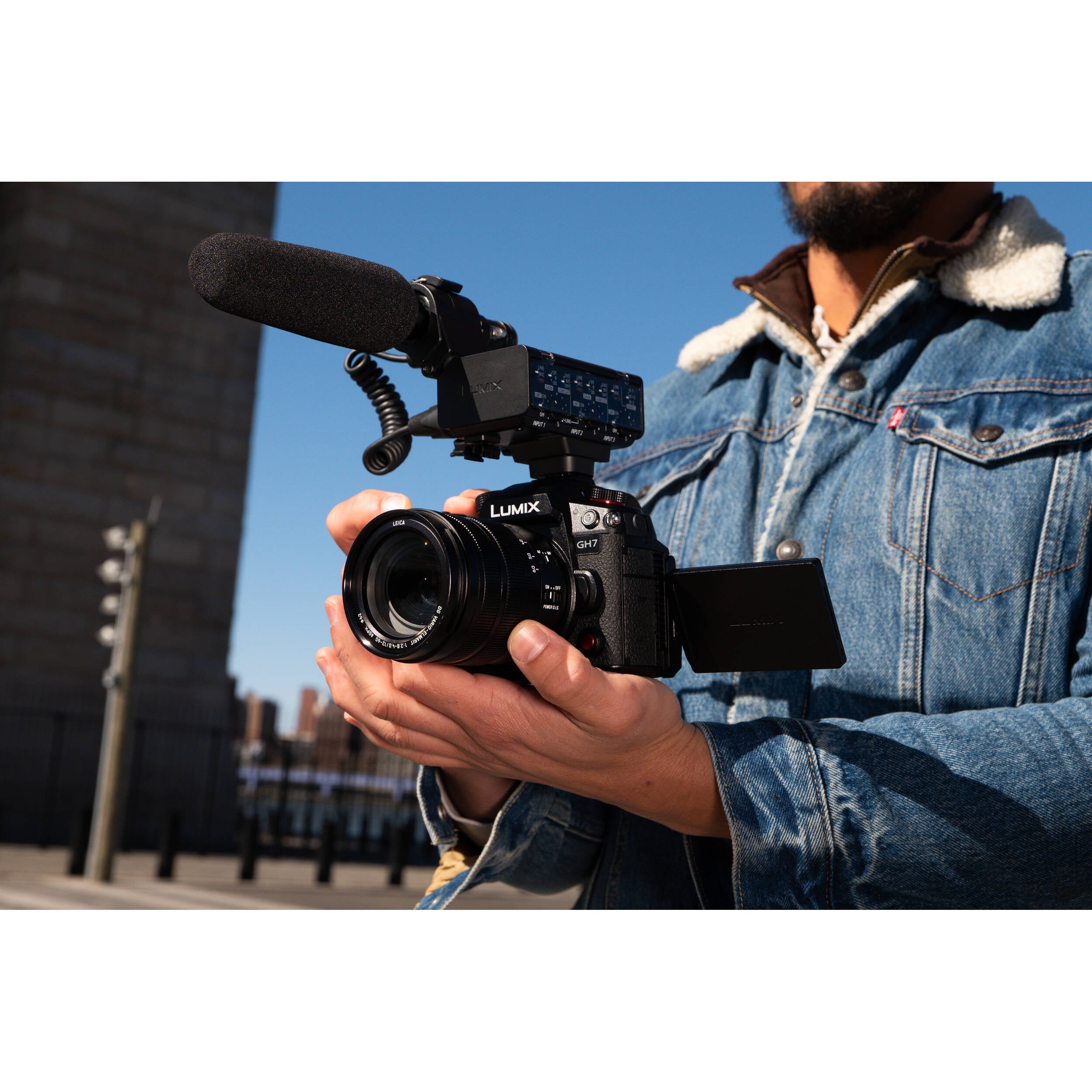 Panasonic Lumix GH7 mirrorless camera with 12-60mm F/2.8-4 lens for high-quality video and photography.