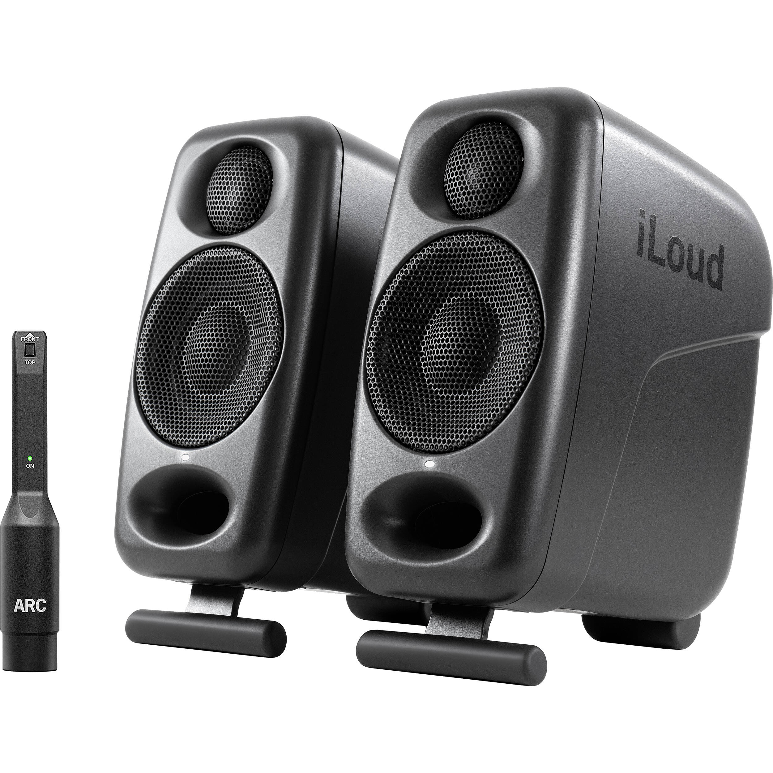 IK Multimedia iLoud Micro Monitor Pro active nearfield monitors showing dual speakers and control interface in a studio setup.