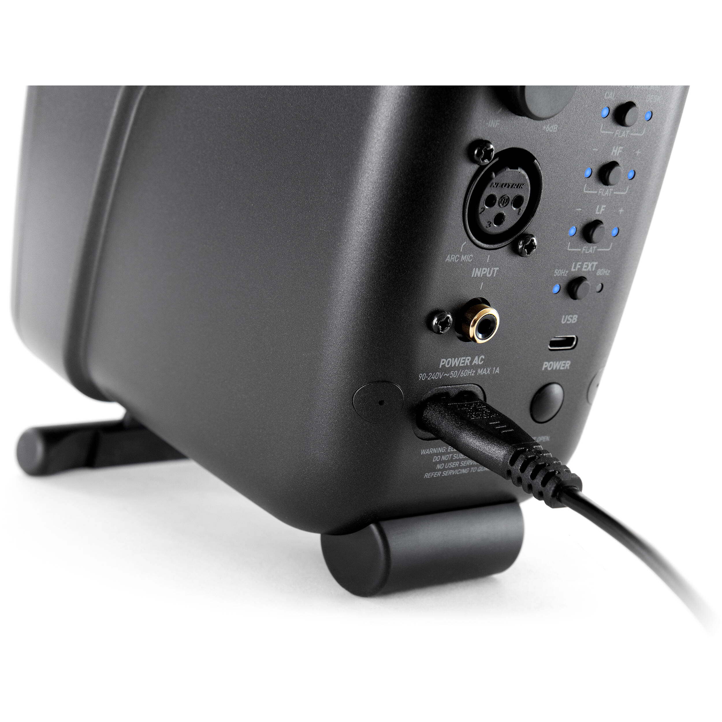 IK Multimedia iLoud Micro Monitor Pro active nearfield monitor with black finish and compact design for music production and sound mixing.