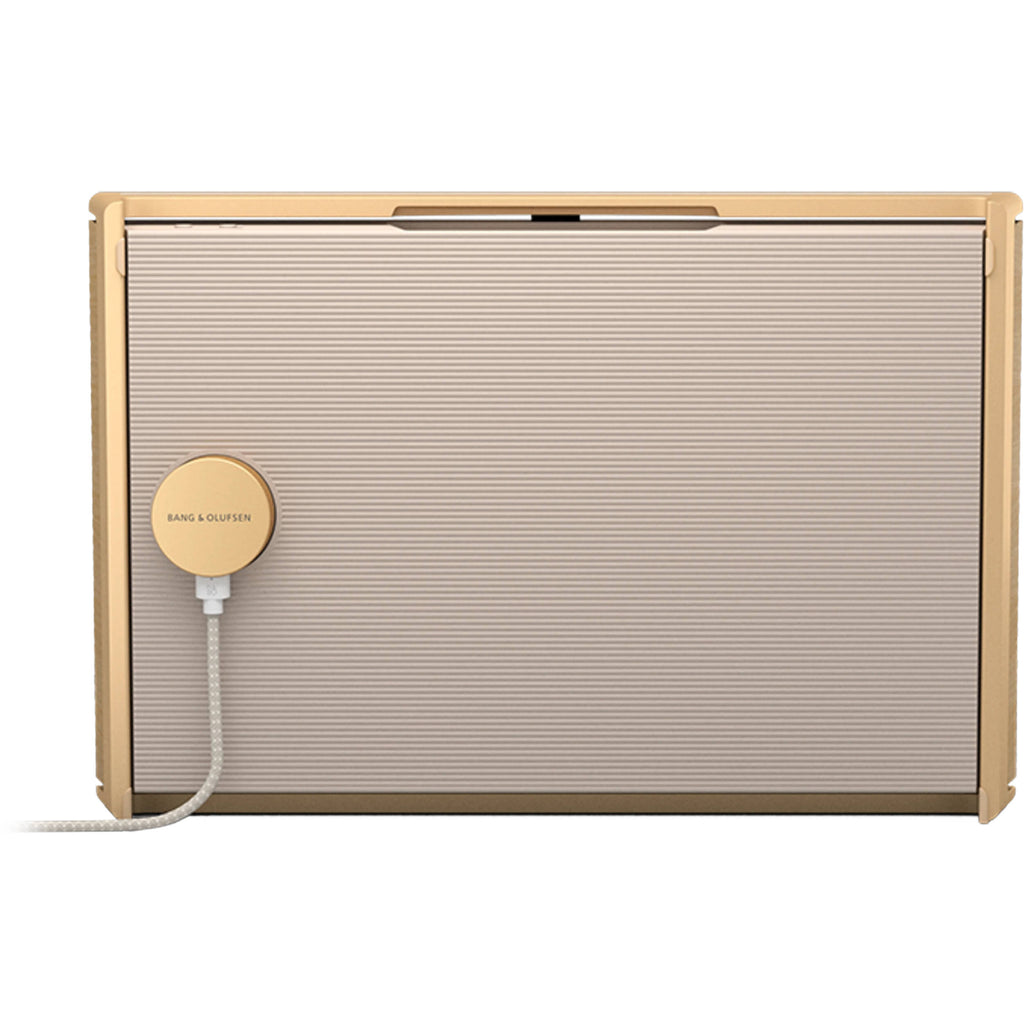 Wireless Bang & Olufsen Beosound Level speaker with sleek design and fabric finish, showcasing its modern, portable audio solution.