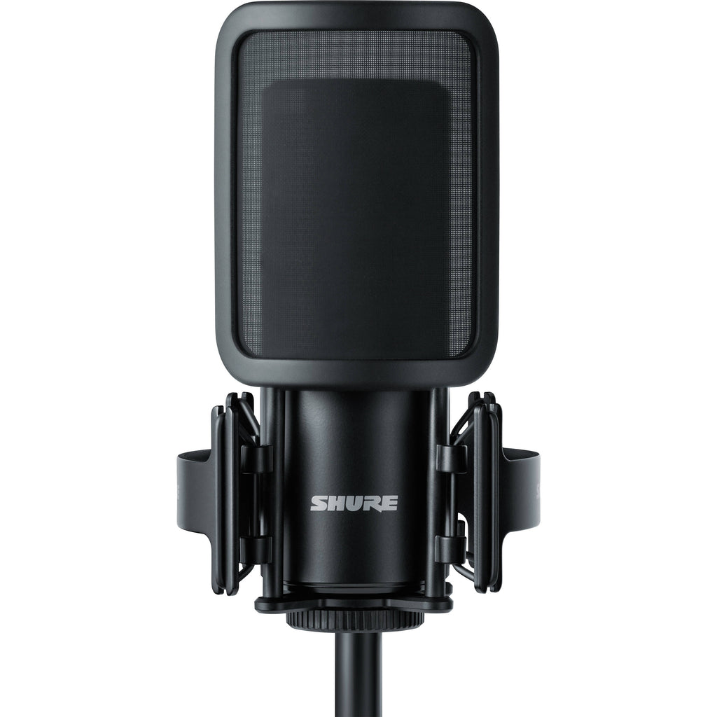 Shure SM4 condenser microphone kit with microphone, stand, and accessories for professional audio recording.