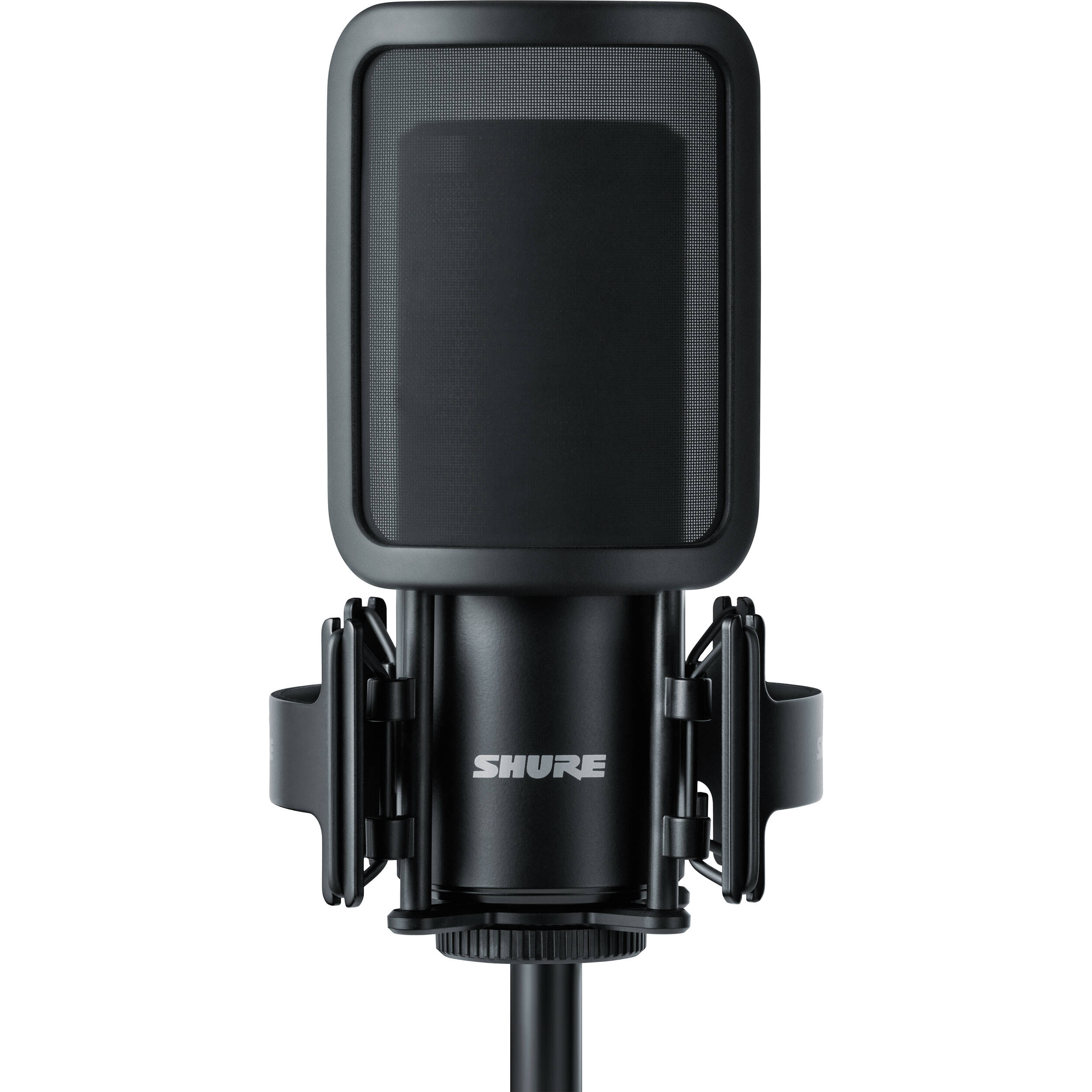 Shure SM4 condenser microphone kit with microphone, stand, and accessories for professional audio recording.