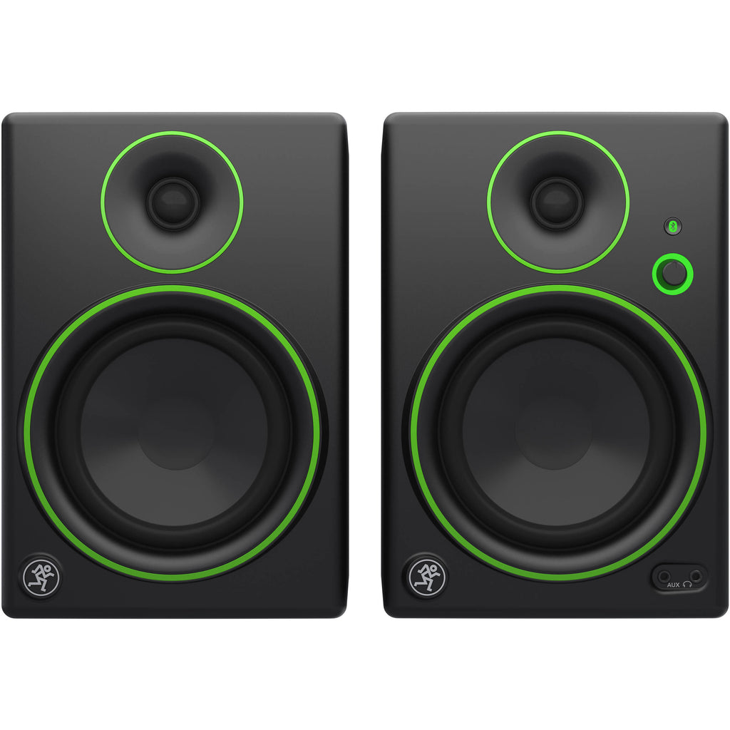 Mackie CR5BT desktop speakers with black finish, connected to a computer, showing control knobs and audio cables.