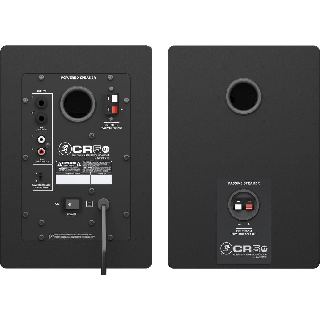 Mackie CR5BT desktop speakers with black finish, featuring control knobs and audio input ports, designed for home or office use.