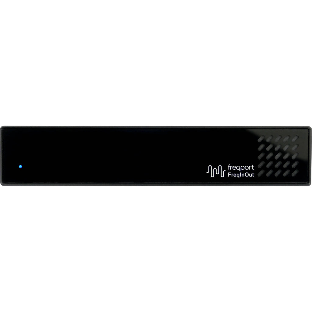 Freqport FreqInOut FO1 audio interface with multiple input and output ports, compact design, and professional audio connectivity.