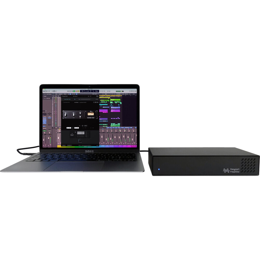 Freqport FreqInOut FO1 audio interface with multiple input and output ports, compact design, and professional audio connectivity.