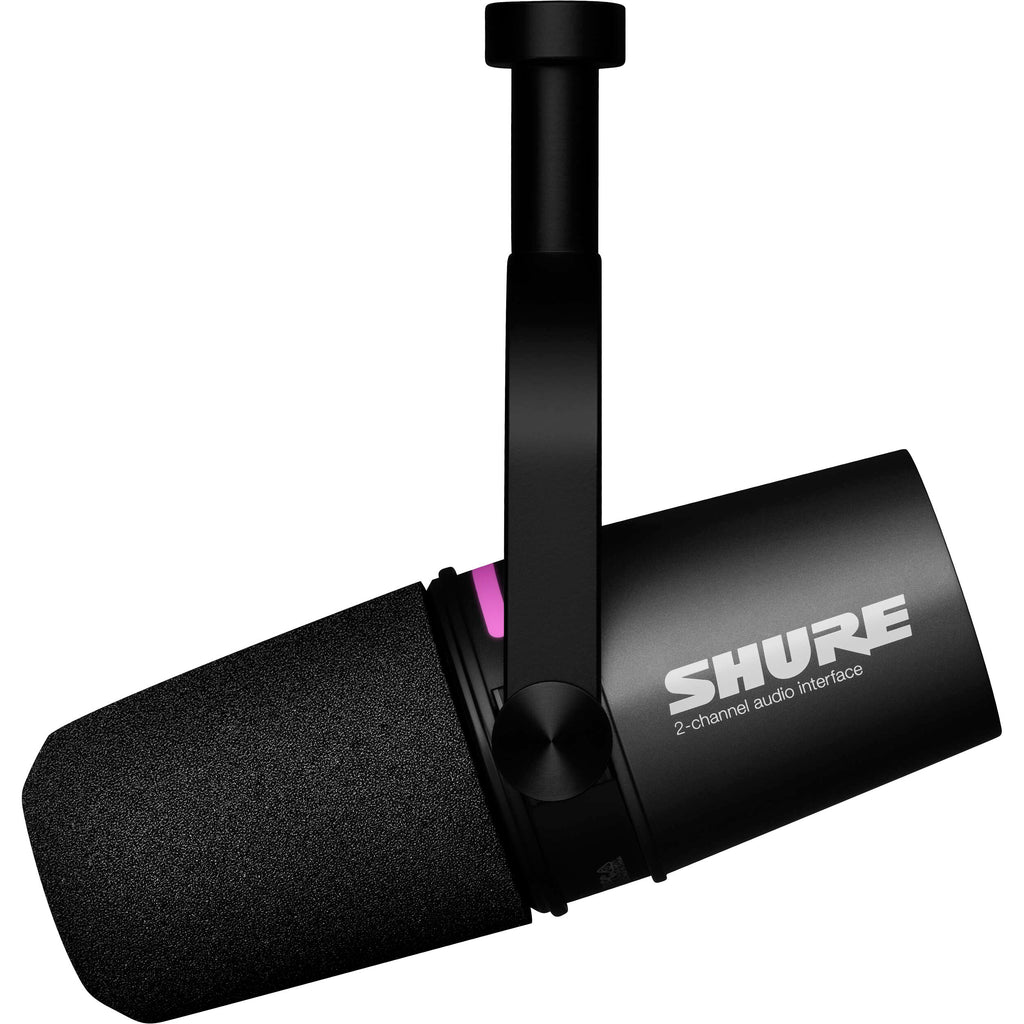 Shure MV7i USB microphone shown on a desk with a pop filter and stand, ideal for podcasting and streaming.