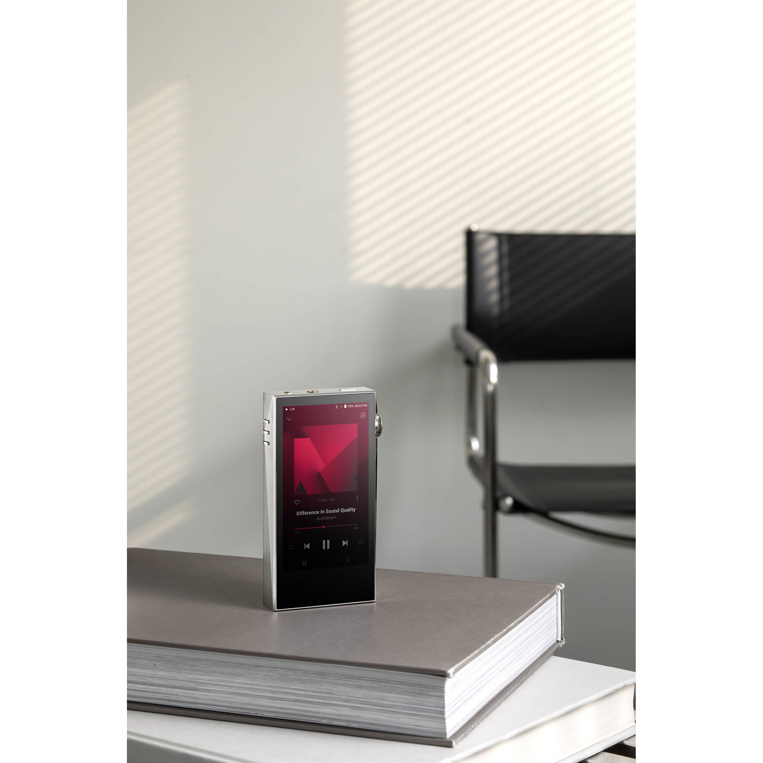 Astell&Kern A&ultima SP3000M portable music player with sleek design and high-resolution display.