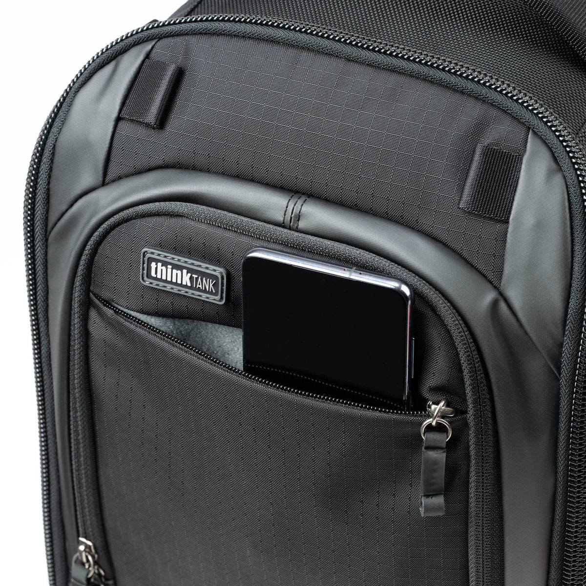 Think Tank Walker Pro Series backpack for video equipment, black camera and gear bag with multiple compartments and padded straps.