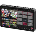YoloLiv YoloBox Extreme video monitor displaying live streaming interface with buttons and screen, portable broadcast device in use