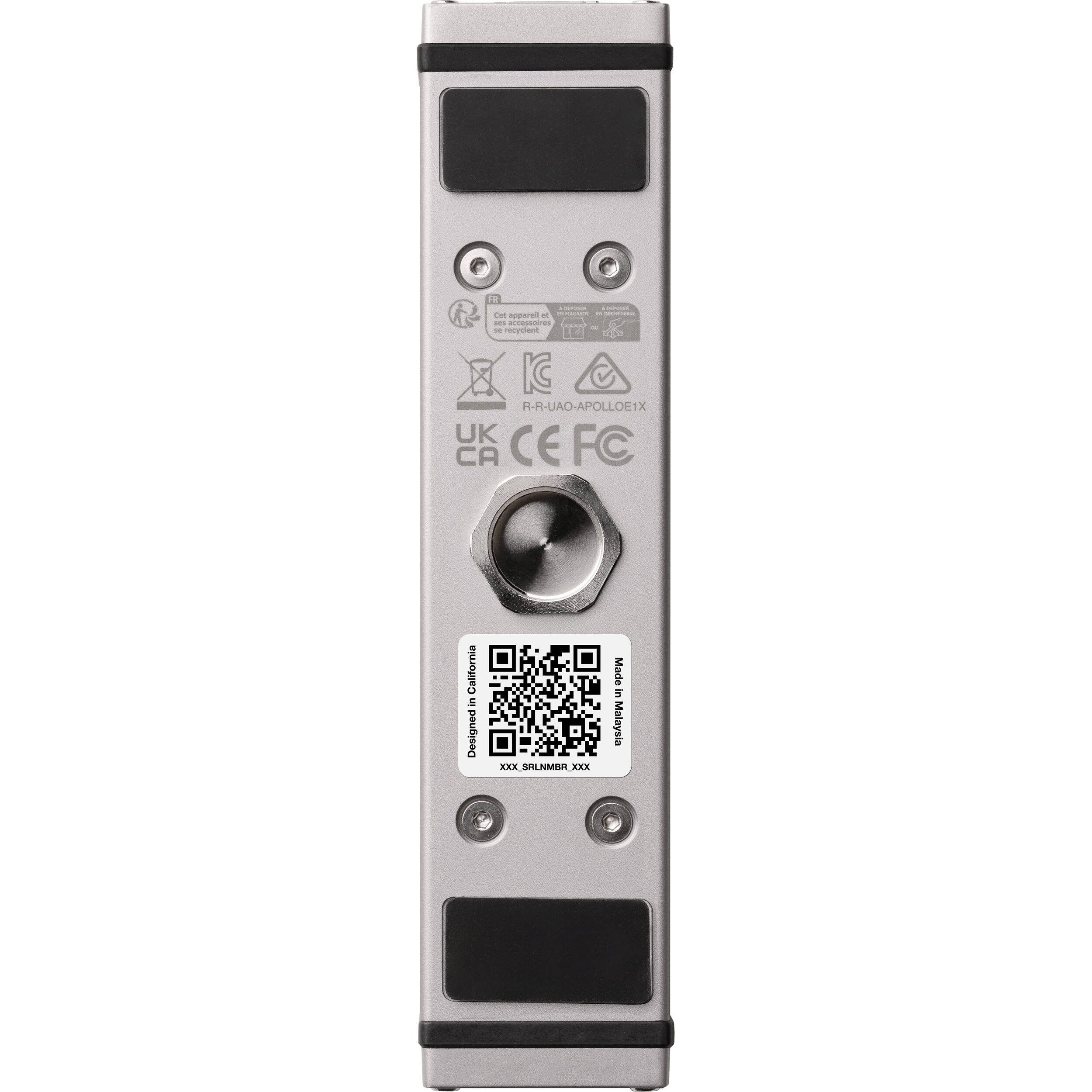 Universal Audio Apollo e1x microphone preamp with sleek design and multiple input options displayed on a wooden surface.