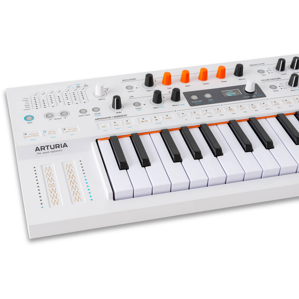 Arturia MiniFreak synthesizer with vocoder feature, compact keyboard with control knobs and colorful display screen.