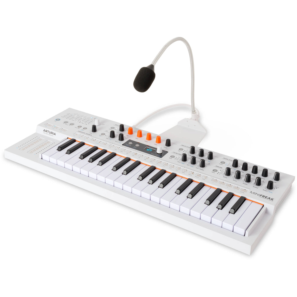 Arturia MiniFreak synthesizer with vocoder feature, compact electronic music instrument with various knobs and controls.
