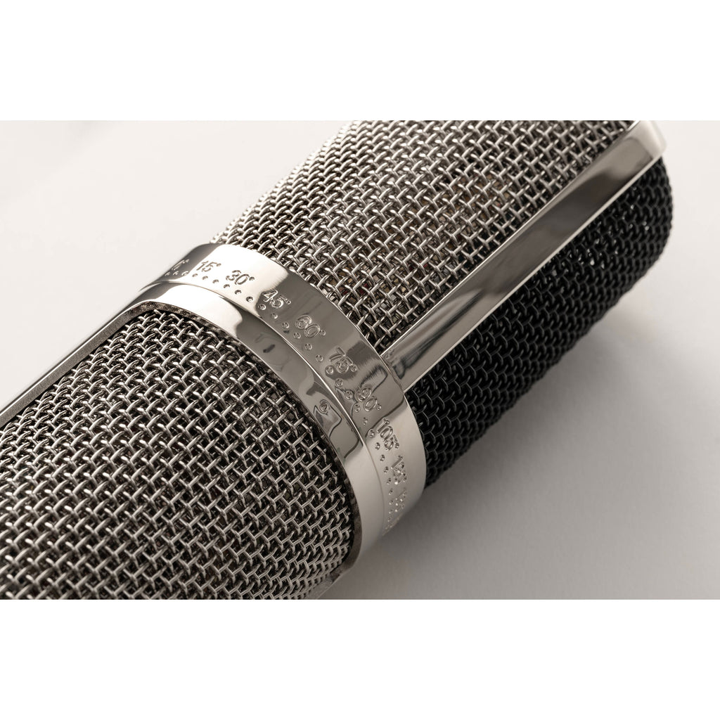 Warm Audio WA-CX24 condenser microphone with metal body and grille, suitable for studio recording and vocal capturing.