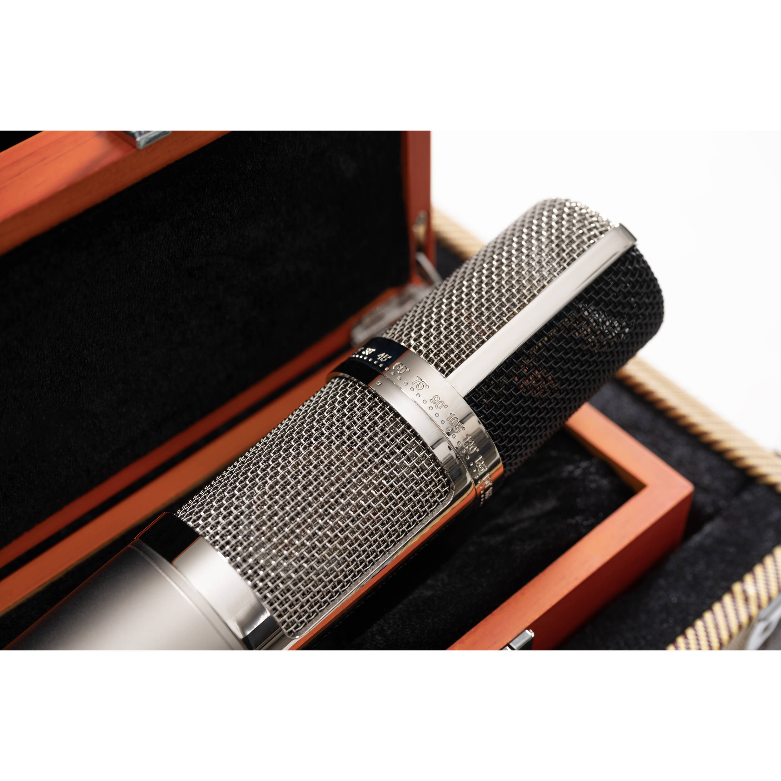 Warm Audio WA-CX24 condenser microphone shown with its sleek design and metal grille, ideal for studio recording and vocals.