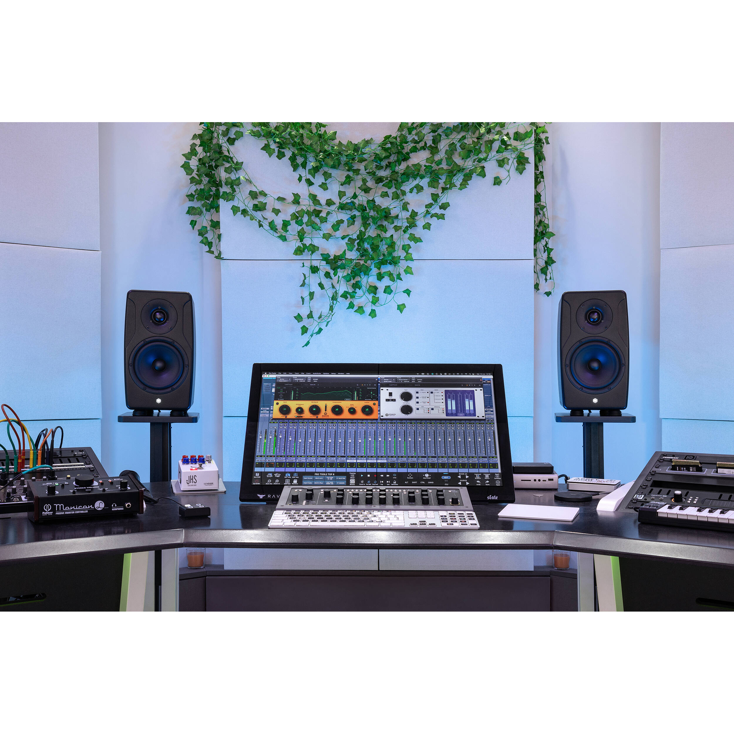 IK Multimedia iLoud Precision 6 MK2 active nearfield monitor showing front view with speaker grille and control panel.