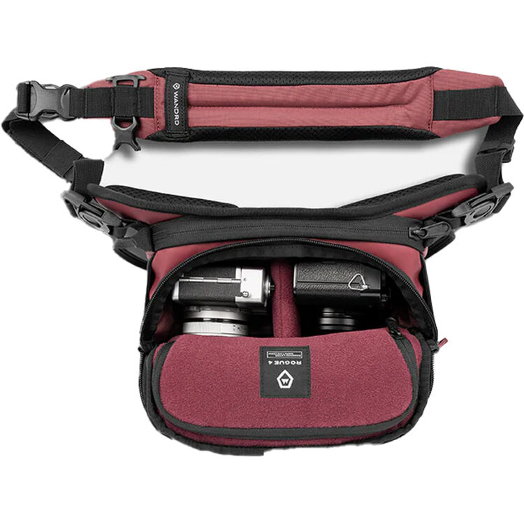 Wandrd Rogue Sling video equipment bag with adjustable strap and multiple compartments for camera gear and accessories.