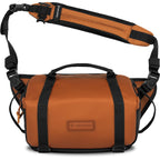 Wandrd Rogue Sling video equipment bag with padded straps and multiple compartments for camera gear and accessories.
