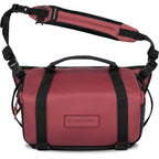 Wandrd Rogue Sling video equipment bag with padded compartments and adjustable strap, designed for camera gear storage and transport.