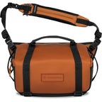Wandrd Rogue Sling camera bag for video equipment, black with adjustable strap, compact and durable design.