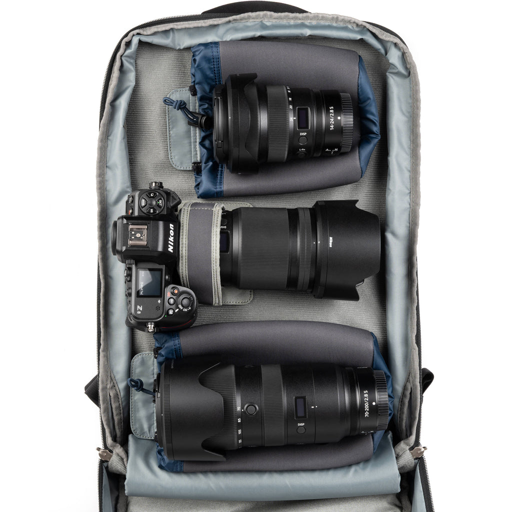 Think Tank Shape Shifter video equipment bag with padded compartments and adjustable straps for versatile gear storage.