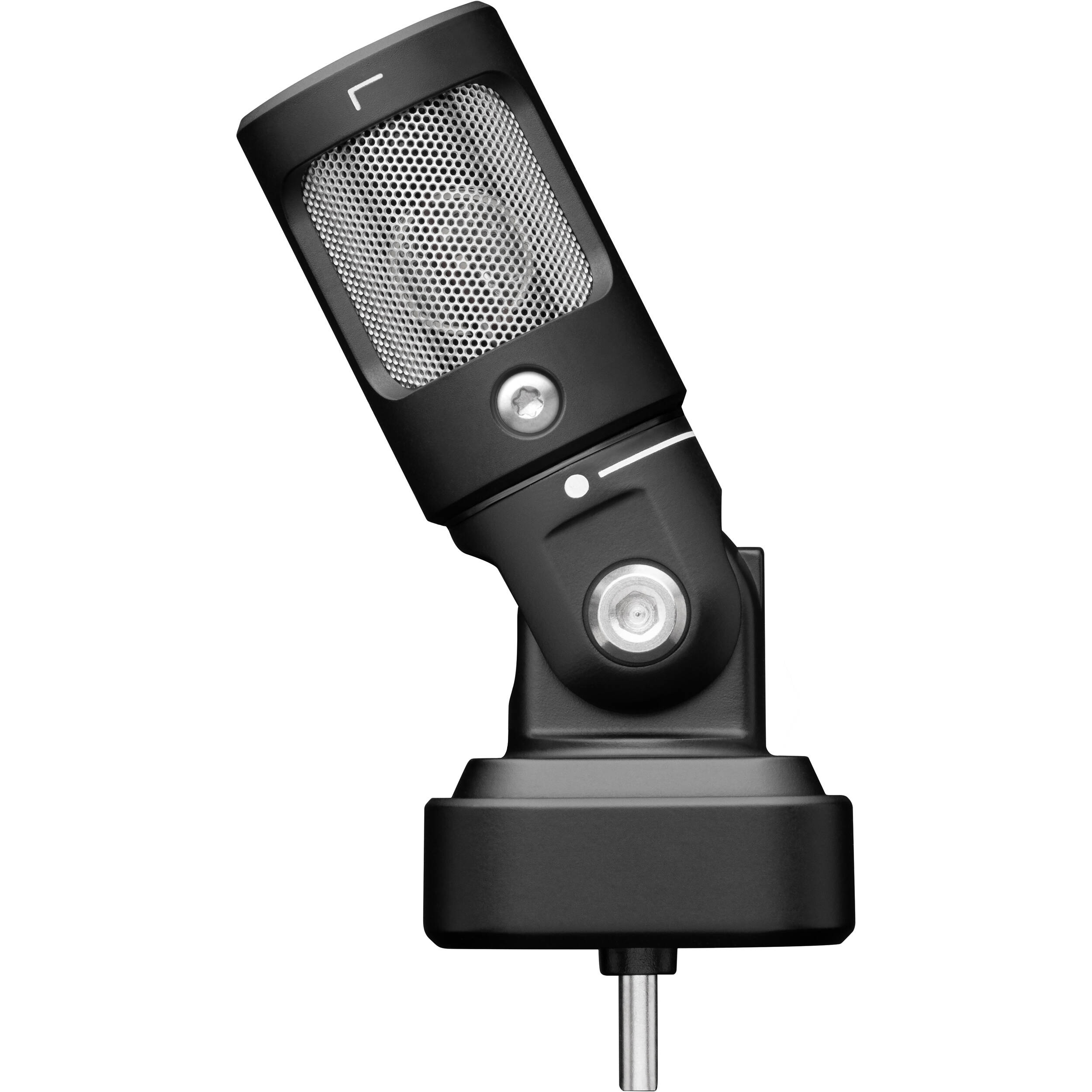 Shure MV88 iOS and Android microphone connected to a smartphone, compact and portable audio recording device.