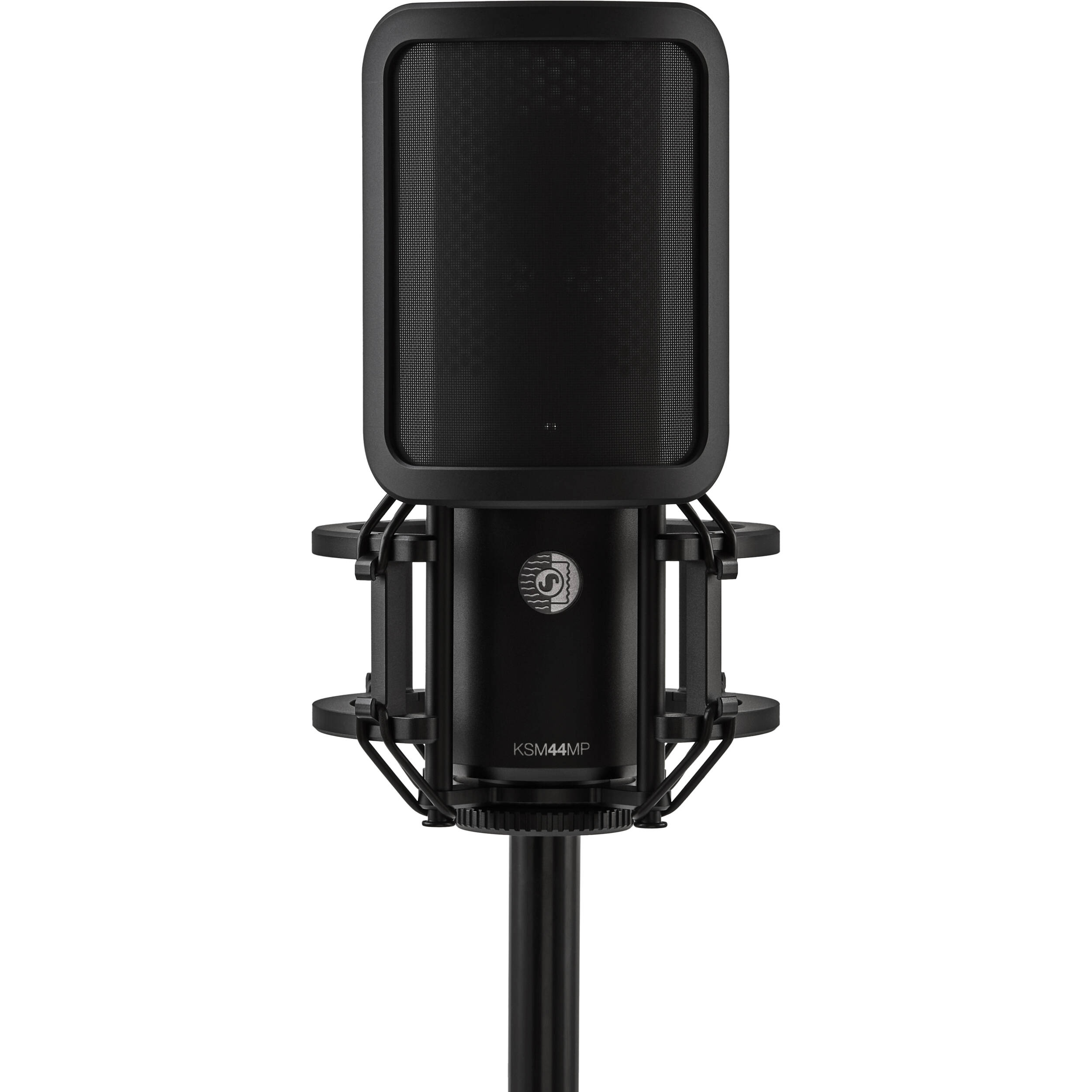 Shure KSM44MP condenser microphone with dual pattern capsules, black finish, and professional audio recording setup.
