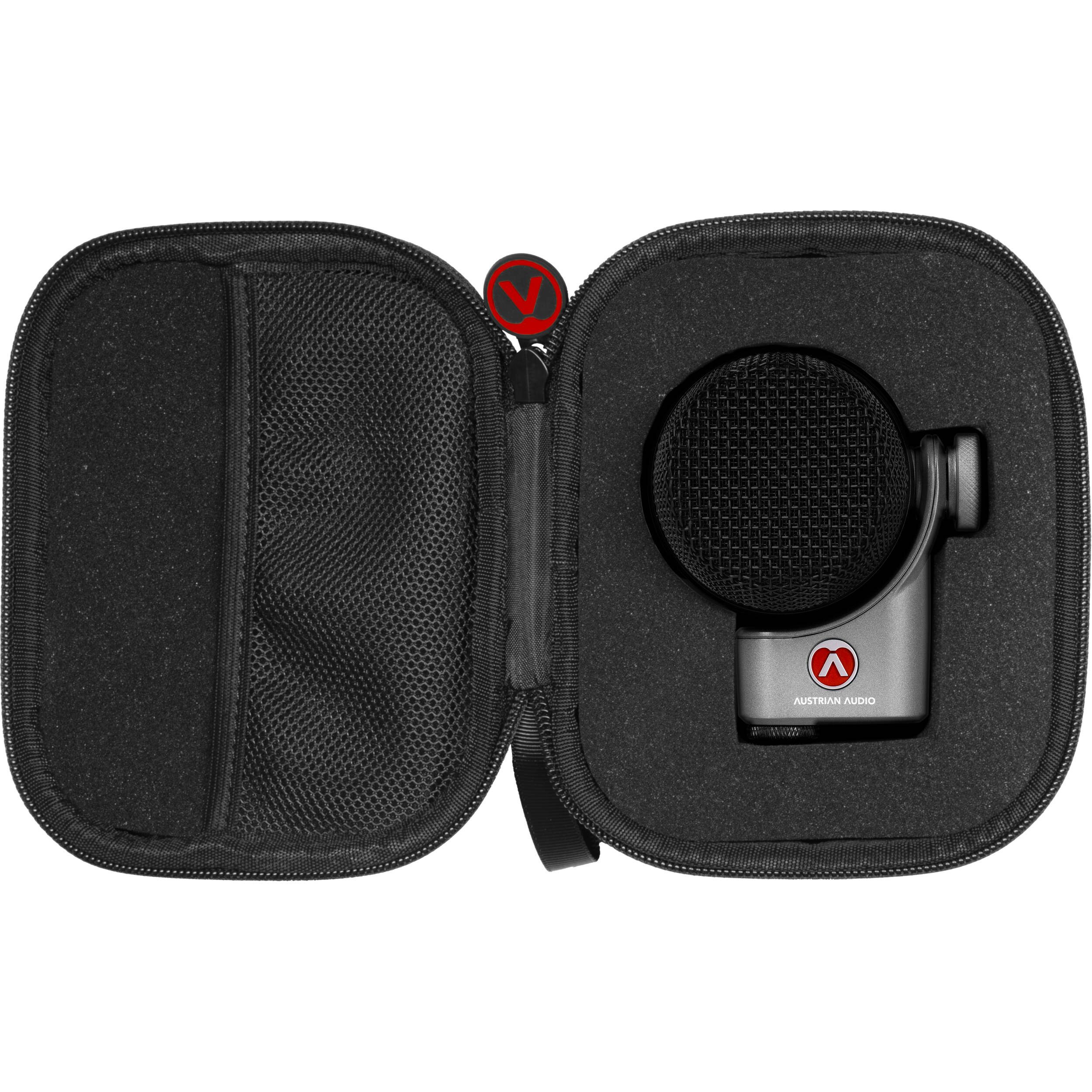 Austrian Audio OC-B6 condenser microphone with black body and grille, professional recording studio setup, close-up view.