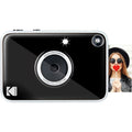 Kodak Printomatic+ instant compact camera with black body and lens, ready to print colorful photos on the spot.