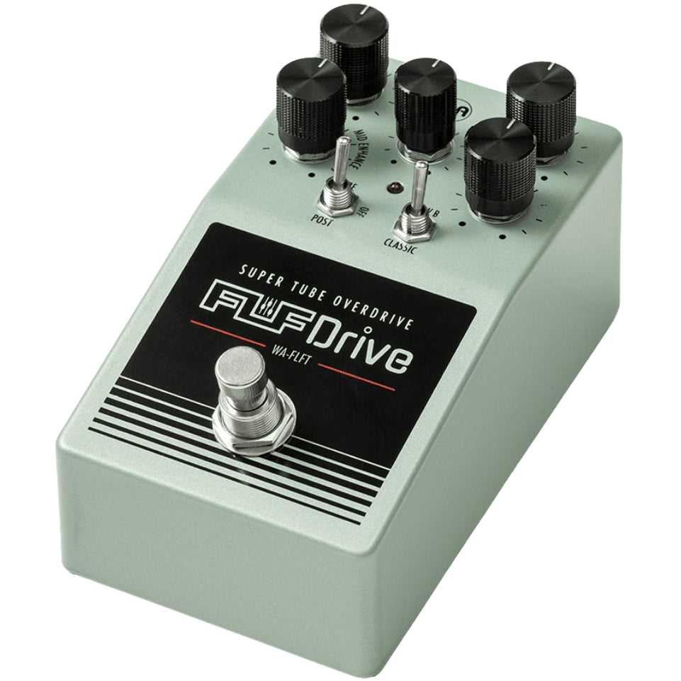 Warm Audio Fluff Drive guitar pedal with control knobs and input/output jacks, showcasing its compact design and warm tone.