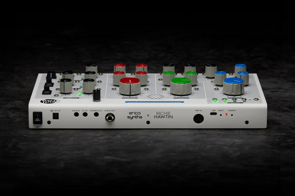Erica Synths Bullfrog desktop synthesizer with knobs, buttons, and patch points on a dark panel for modular sound creation.