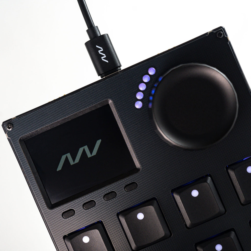 Close-up of Intech Studio VSN1 Series 3 MIDI controller with knobs and buttons, showing detailed controls and sleek design.