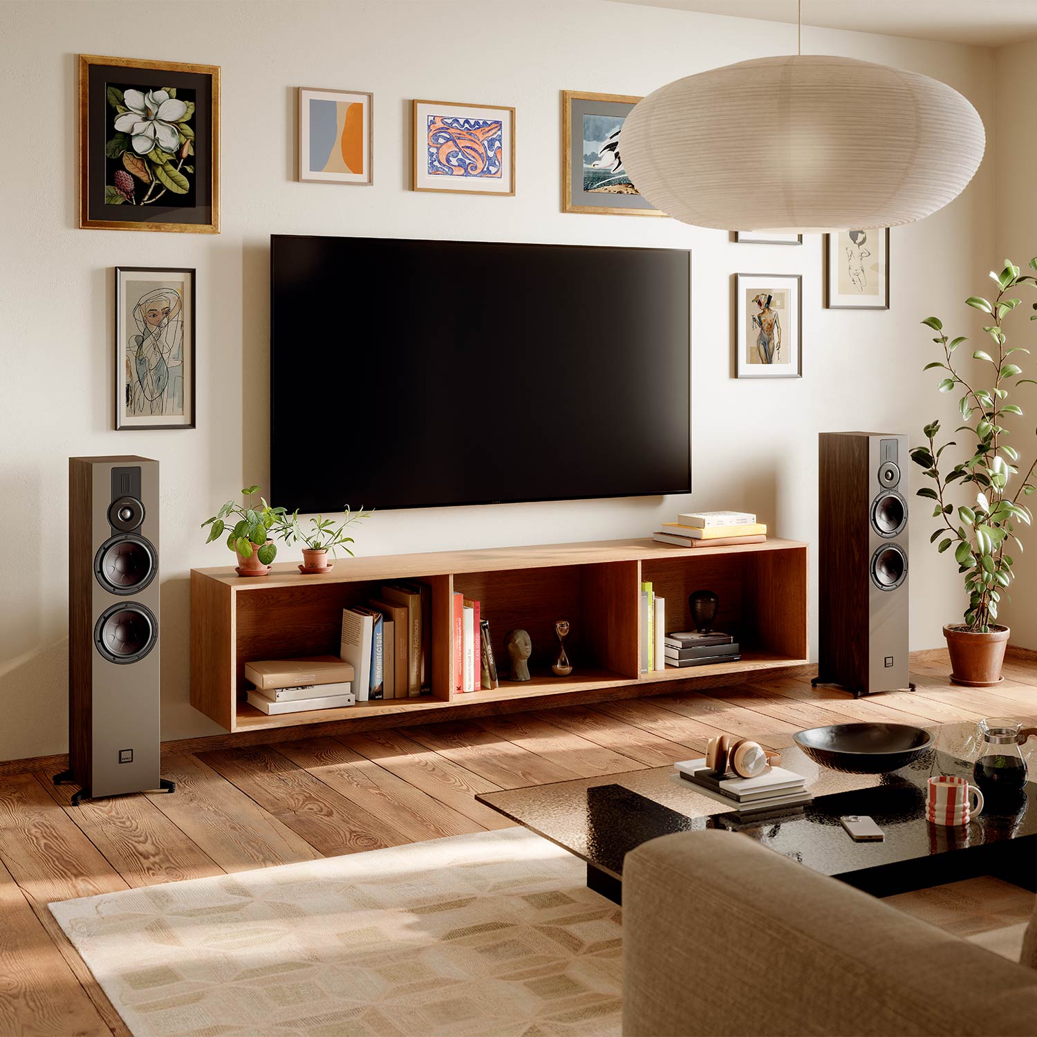 DALI Sonik 7 passive floorstanding speakers with sleek black cabinets and multiple drivers for high-quality audio.