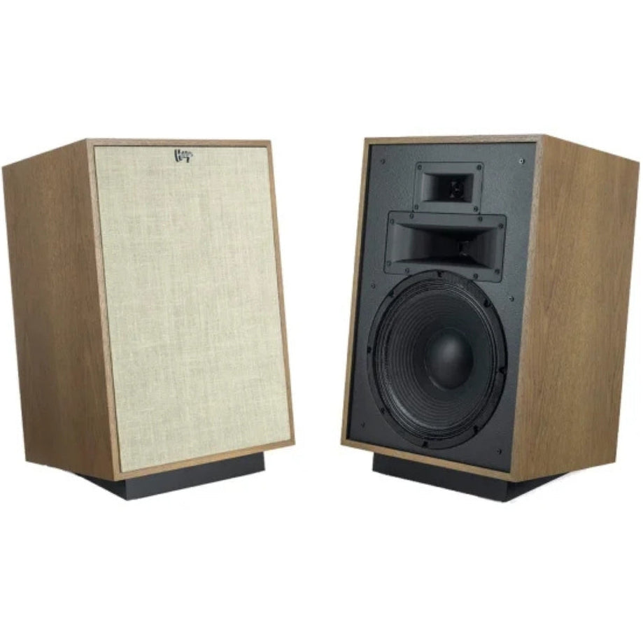 Klipsch Heresy IV floorstanding speakers with black cabinets and silver woofers, showcasing their sleek audio design.