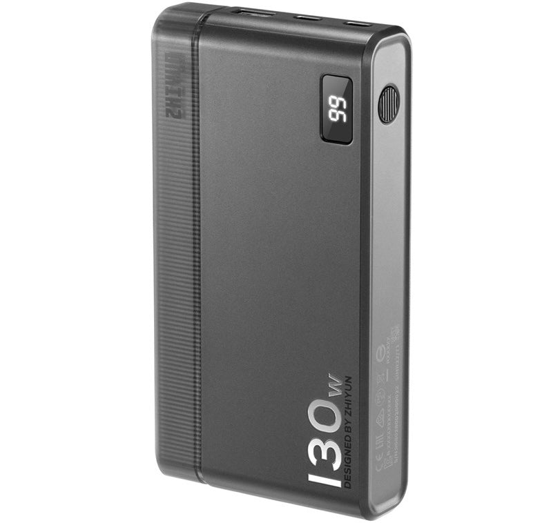 Zhiyun Molus Power Bank 130W with multiple charging ports, compact design, and digital display showing battery level.