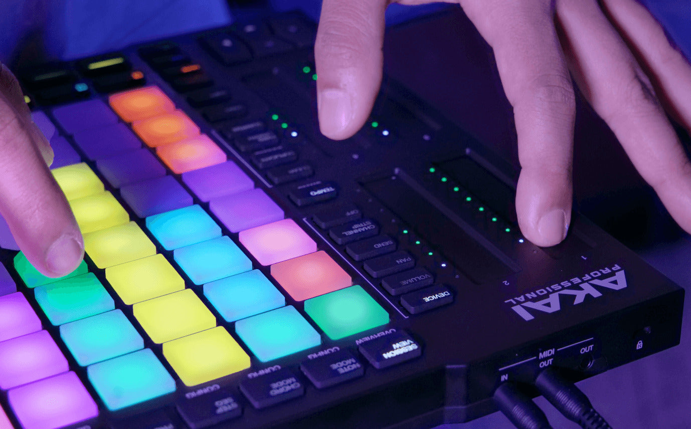 Akai Professional APC64 MIDI controller with grid of colorful pads and buttons for music production and live performance.