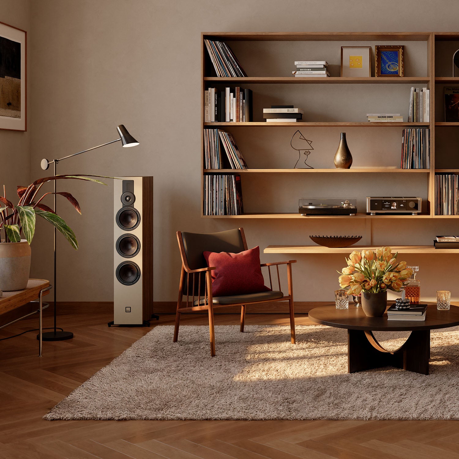 DALI Sonik 9 passive floorstanding speakers with sleek black cabinets and multiple drivers for high-quality home audio.